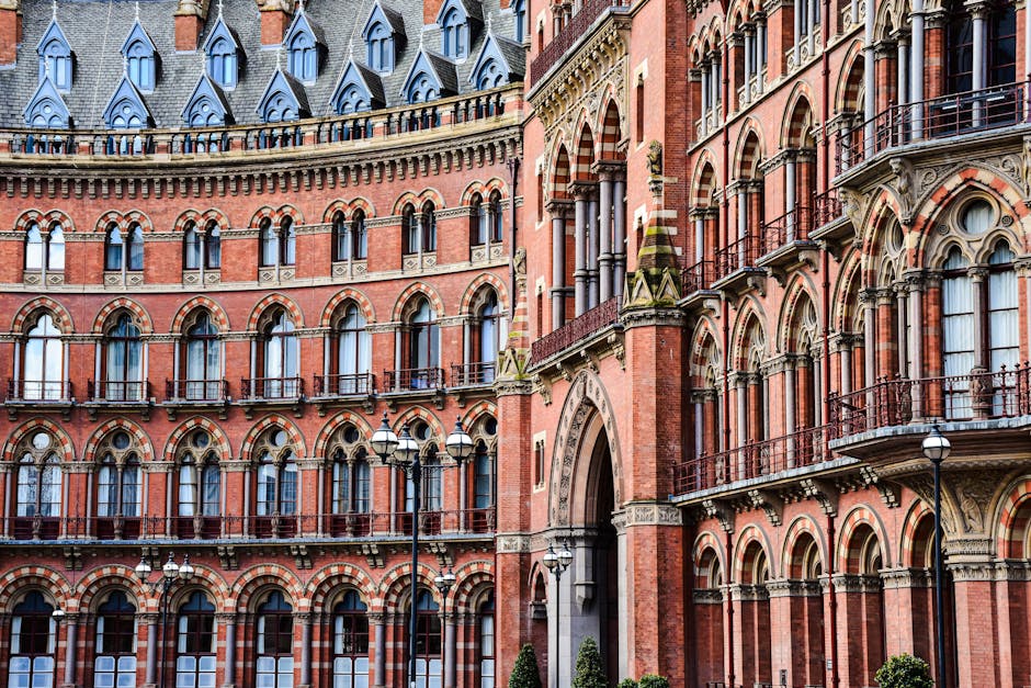 Detailed exterior view of the iconic St Pancras Renaissance Hotel in London, showcasing its Victorian architecture.
