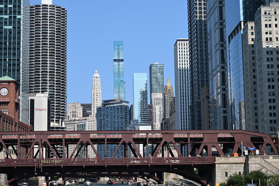 Scenic view of Chicago skyline showcasing Wells Street Bridge with clear skies.