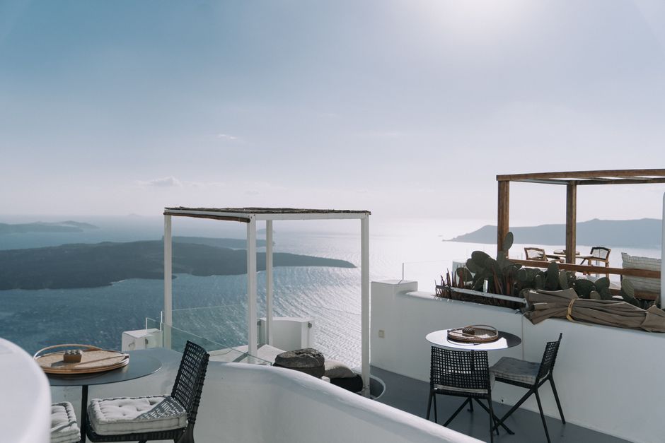 Luxurious terrace with scenic ocean view, perfect for travel destinations.