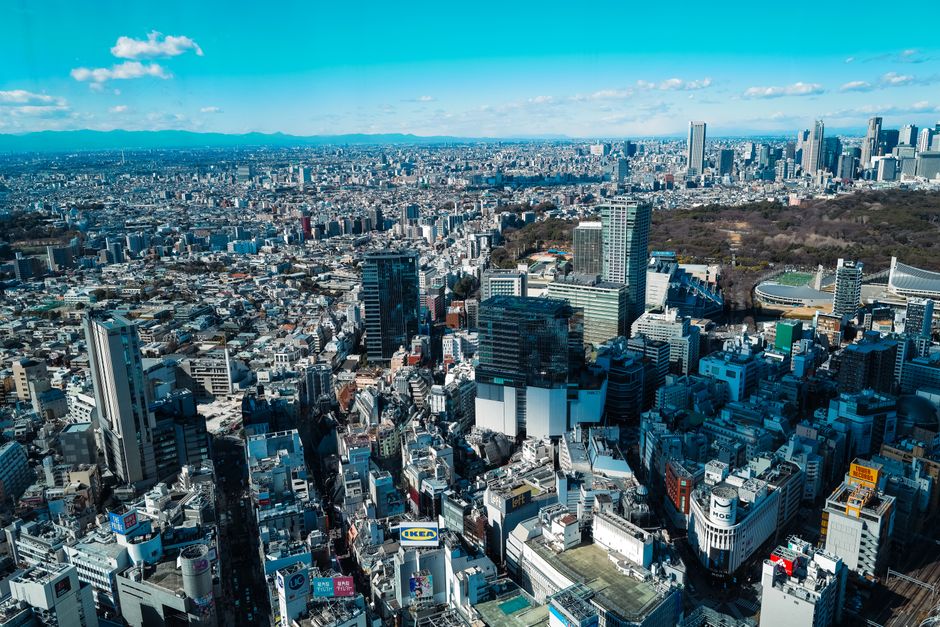A stunning aerial shot of Tokyo showcasing its sprawling urban skyline and famous landmarks.